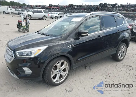 2019 Ford Escape Titanium z USA, uszkodzony, nr VIN 1FMCU9J96KUA29660